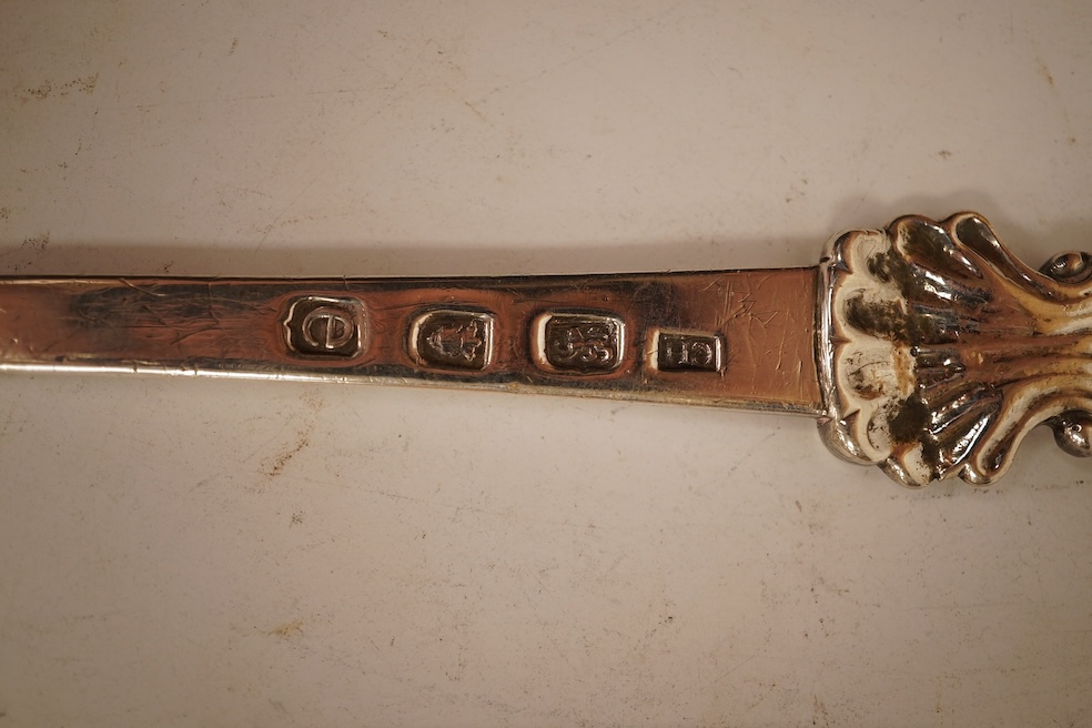 A George III silver meat skewer, with shell terminal and ring handle, Charles Hougham, London, 1780, 26.3cm, together with a George III silver marrow scoop, with engraved crest, Samuel Wintle, London, 1785.